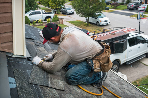 Professional Roofing technician working in Holly, MI